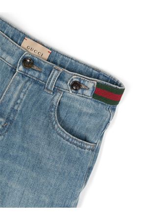 jeans in cotone azzurro GUCCI KIDS | 770083XDCRW4447